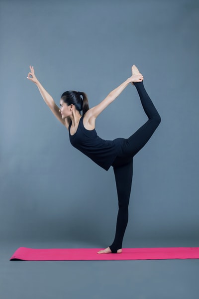 Hands to women who dress in black vest and black trousers
